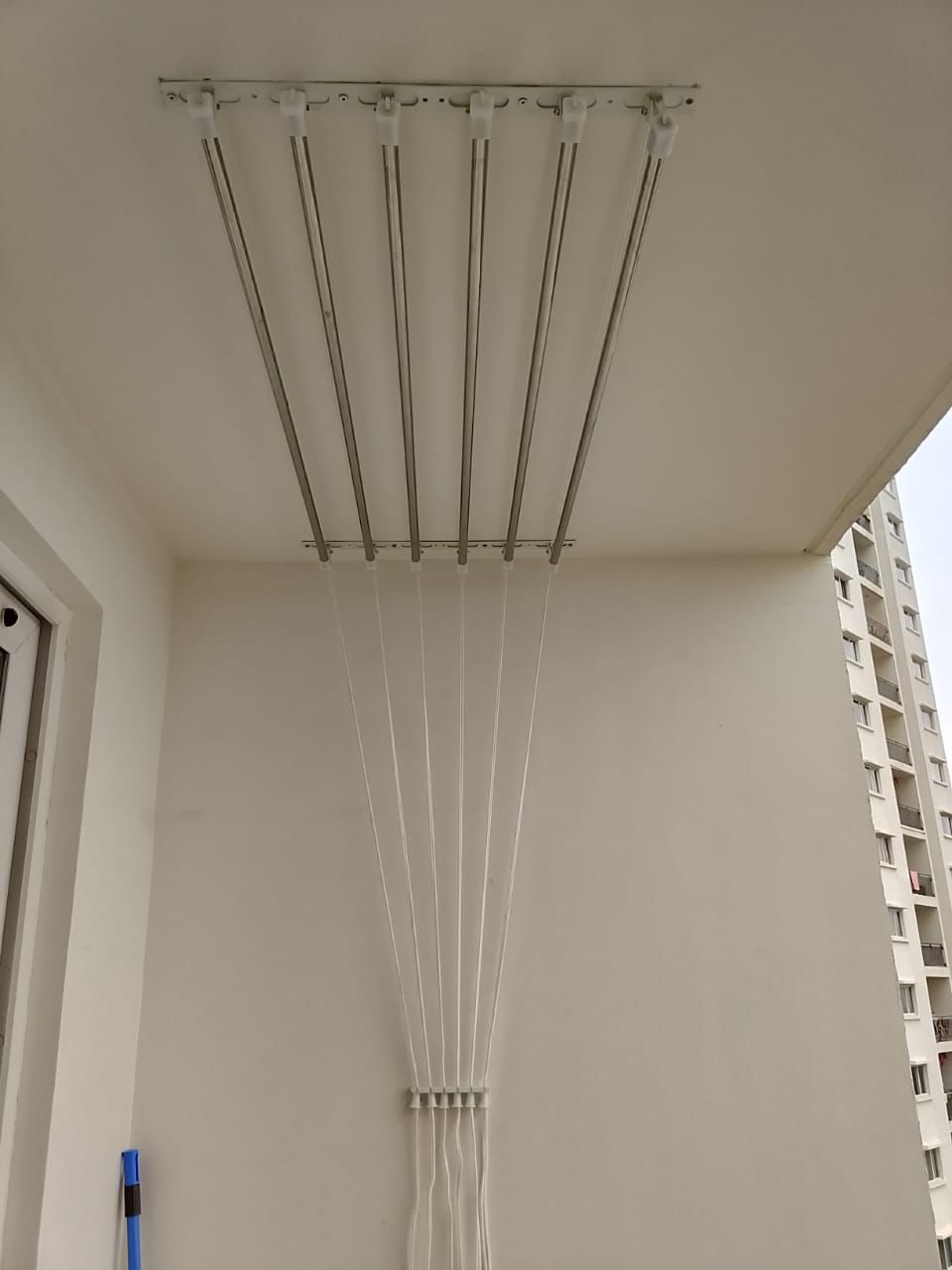 Cloth hanger for utility area